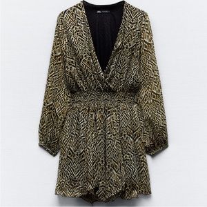 L. SHORT PRINTED DRESS